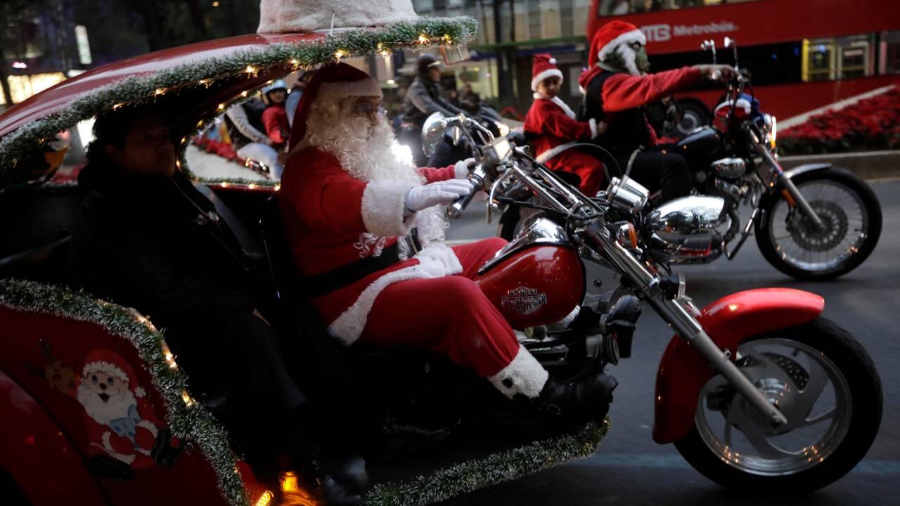 Participants dressed as Santa Claus take part in the annual motorcycle ride in Mexico City (Image: Reuters)