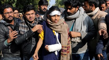 File image of JNUSU president Aishe Ghosh (centre) after being attacked during violence on the university campus in 2020