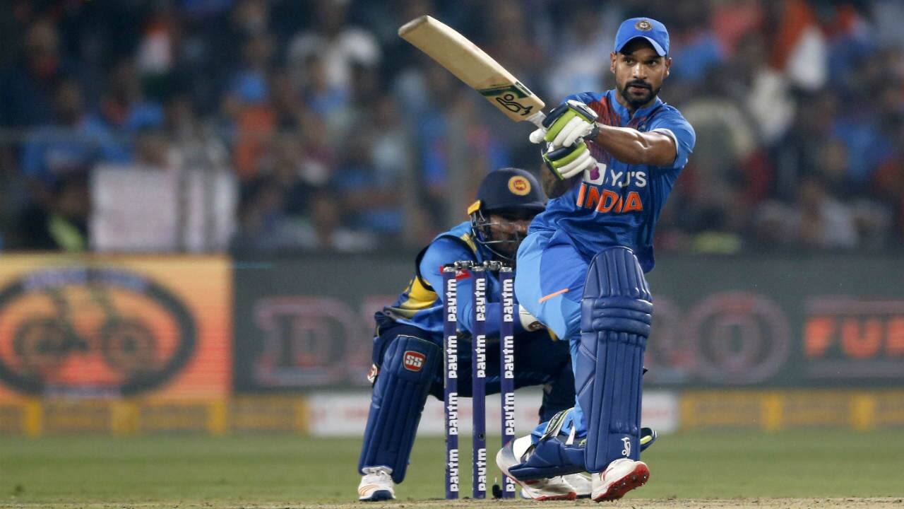 Indian openers Shikhar Dhawan and KL Rahul got India off to a quick start adding 97 runs for the first wicket off just 65 balls. Dhawan was the first to complete his half-century off just 34 balls, but was dismissed soon after when he found a fielder when going for the big shot against Danushka Gunathilaka in the 10th over. Dhawan returned with 52 off 36 balls. (Image: AP) Indian openers Shikhar Dhawan and KL Rahul got India off to a quick start adding 97 runs for the first wicket off just 65 balls. Dhawan was the first to complete his half-century off just 34 balls, but was dismissed soon after when he found a fielder when going for the big shot against Danushka Gunathilaka in the 10th over. Dhawan returned with 52 off 36 balls. (Image: AP)