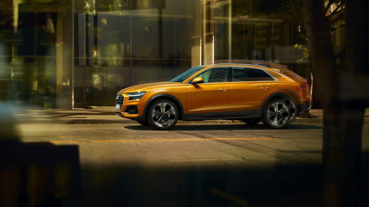 The sloping roofline also adds to the coupe stance along with the aggressive splitter and dual trapezoidal exhausts. (Image source: Audi)