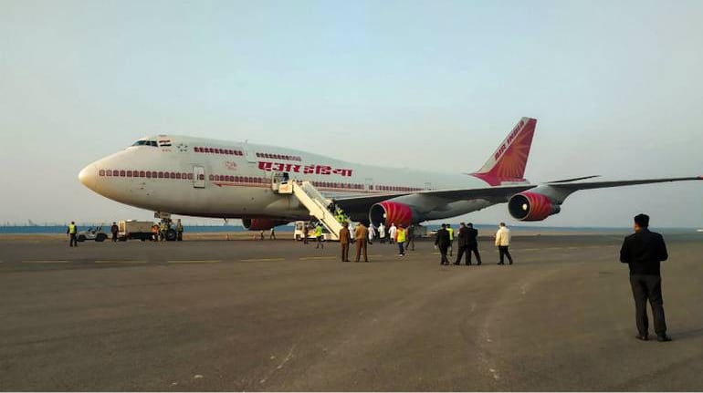 https://images.moneycontrol.com/static-mcnews/2020/02/In-this-handout-photo-provided-by-the-Indo-Tibetan-Border-Police-shows-an-Air-India-aircraft-that-brought-back-Indians-from-Wuhan-stands-after-arrival-at-the-airport-in-New-Delhi-India-Saturday-Feb-1-2020-PTI-770x435.jpg?impolicy=website&width=770&height=431