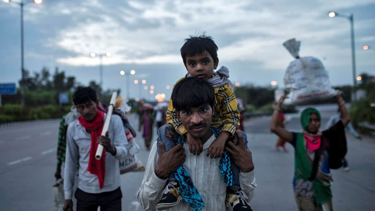 These migrant workers who cannot afford to survive in cities without jobs are returning back to their villages. (Image: Reuters)