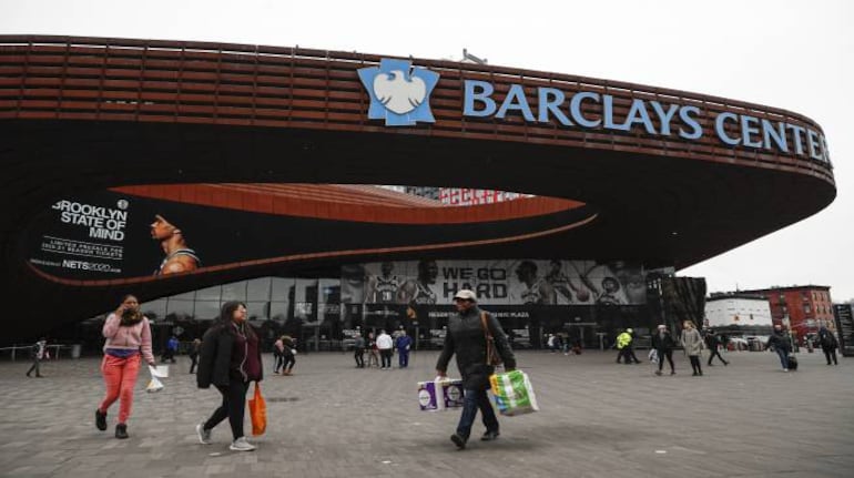 Pedestrians walk past the Barclays Center, which is home to the Brooklyn Nets (Image: AP Photo/John Minchillo, File) Pedestrians walk past the Barclays Center, which is home to the Brooklyn Nets (Image: AP Photo/John Minchillo, File)