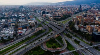 An empty cloverleaf tells the story of a city on lockdown in Bogota, March 20, 2020. (Federico Rios/The New York Times)