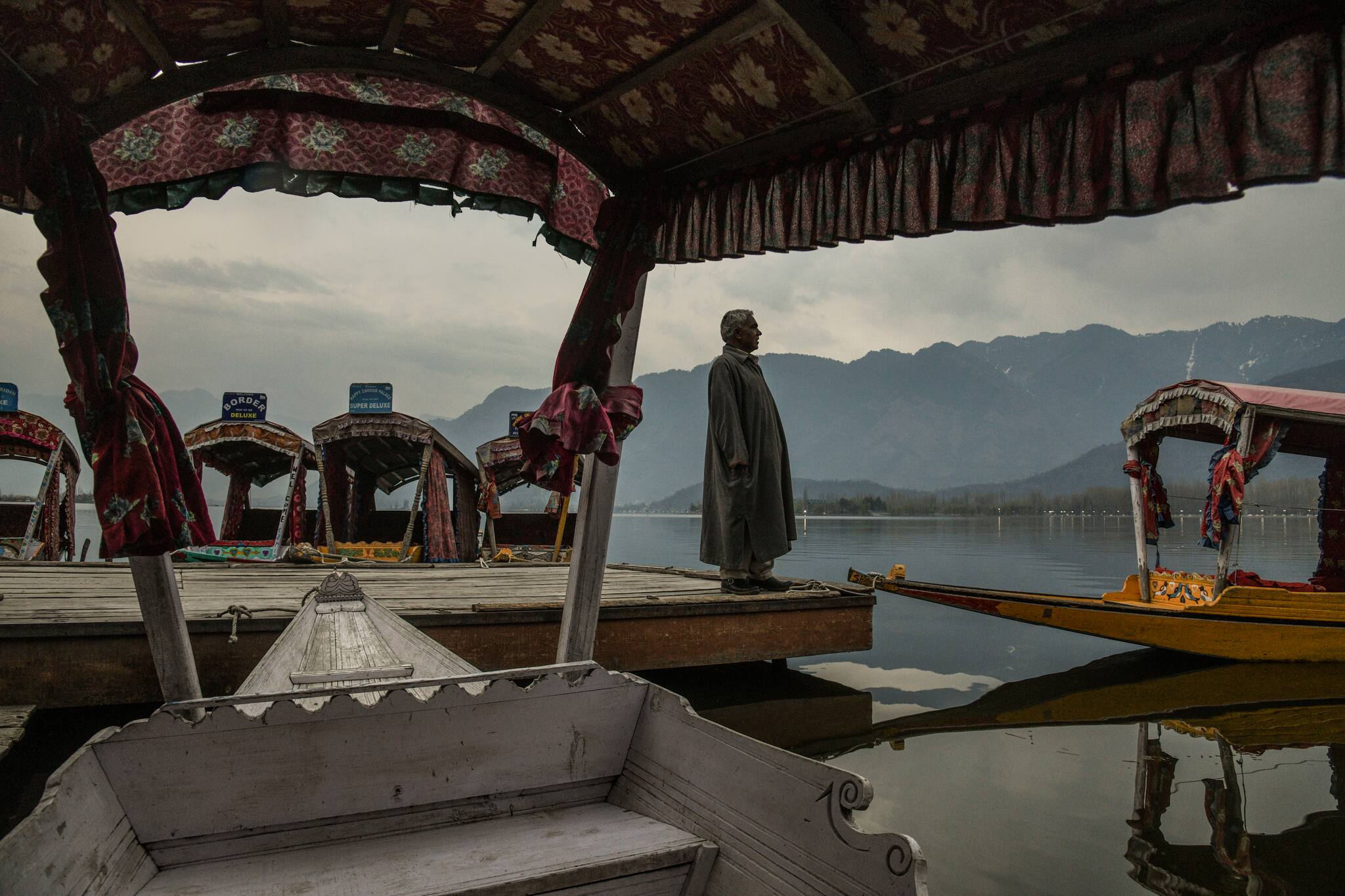 Shikara owners wait at the Dal Lake for customers March 17, 2020. The six month tourist season sustains them for the year. (Atul Loke/The New York Times)