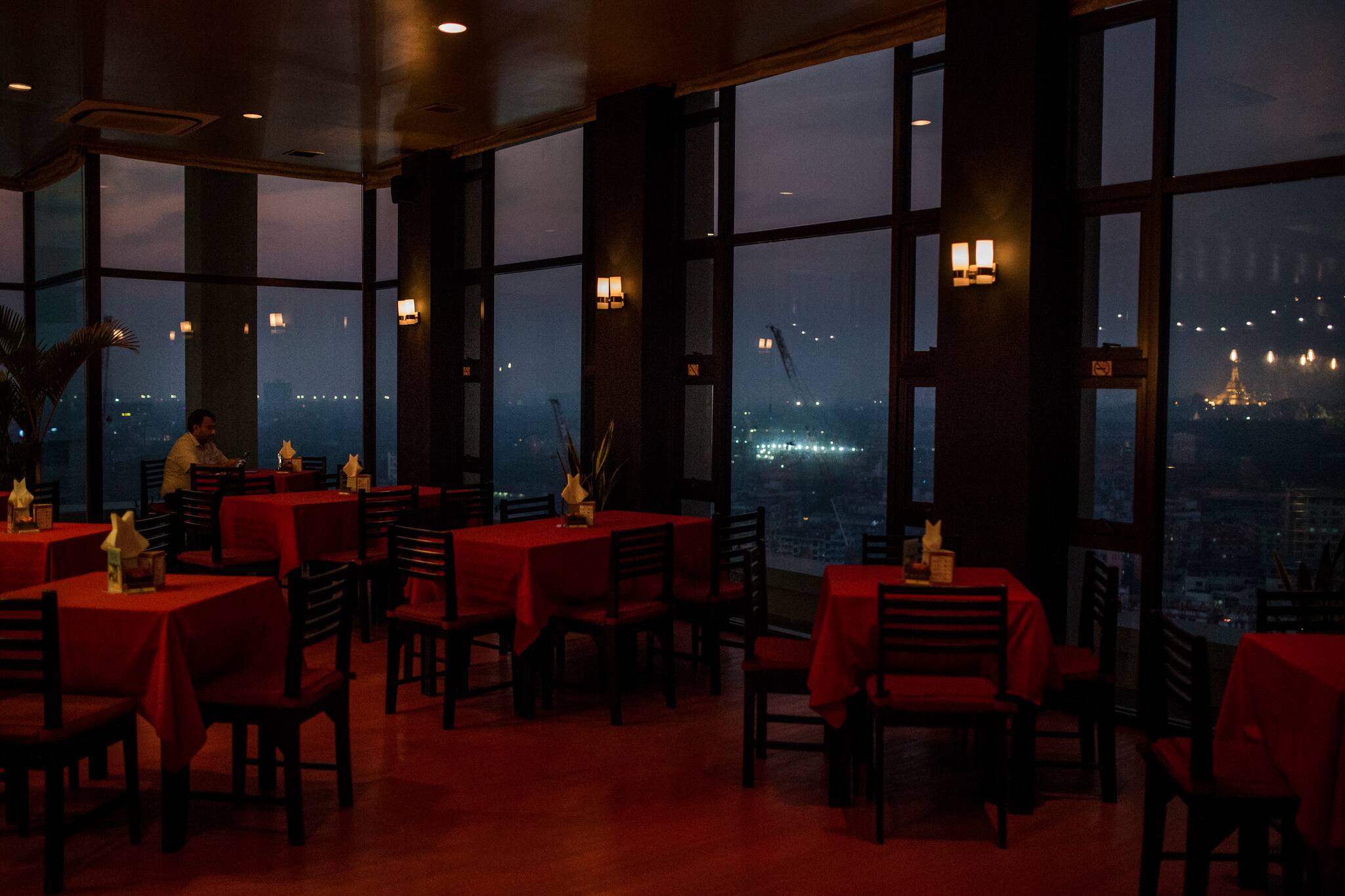 A nearly empty restaurant once popular among tourists for the panoramic view of downtown Yangon, Myanmar, March 19, 2020. (Minzayar Oo/The New York Times)