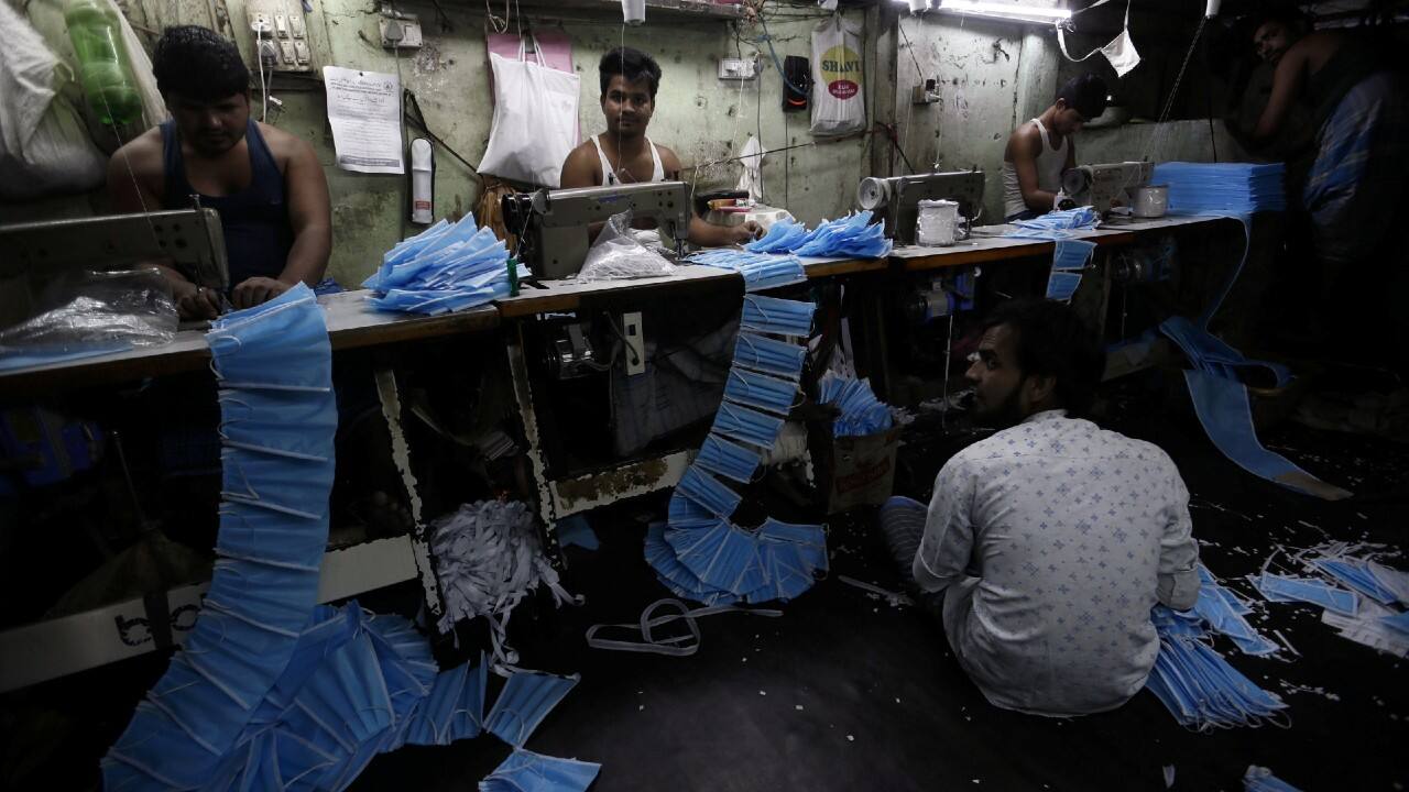 workers-making-face-mask-covid.jpg