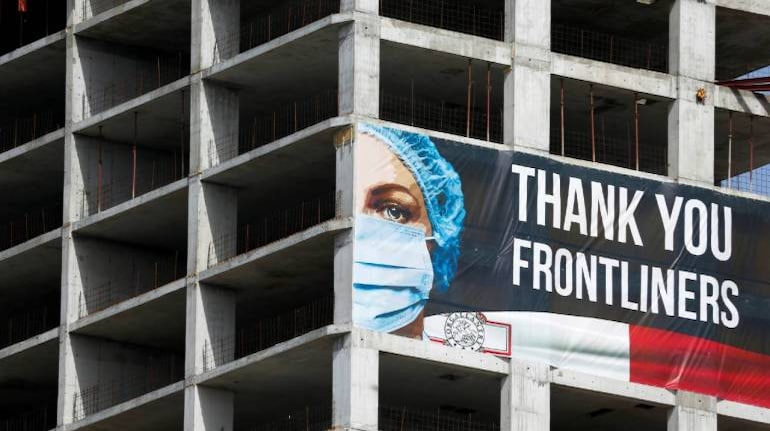 A Banner Thanking Frontline Health Workers Hangs On A High-Rise Building Construction Site In St Julian's, Malta, During The Outbreak Of The Coronavirus Disease, April 14, 2020. Malta Is Now Among The Safest Places To Travel, According To A Report By The European Centre For Disease Prevention And Control. (Image: Reuters)