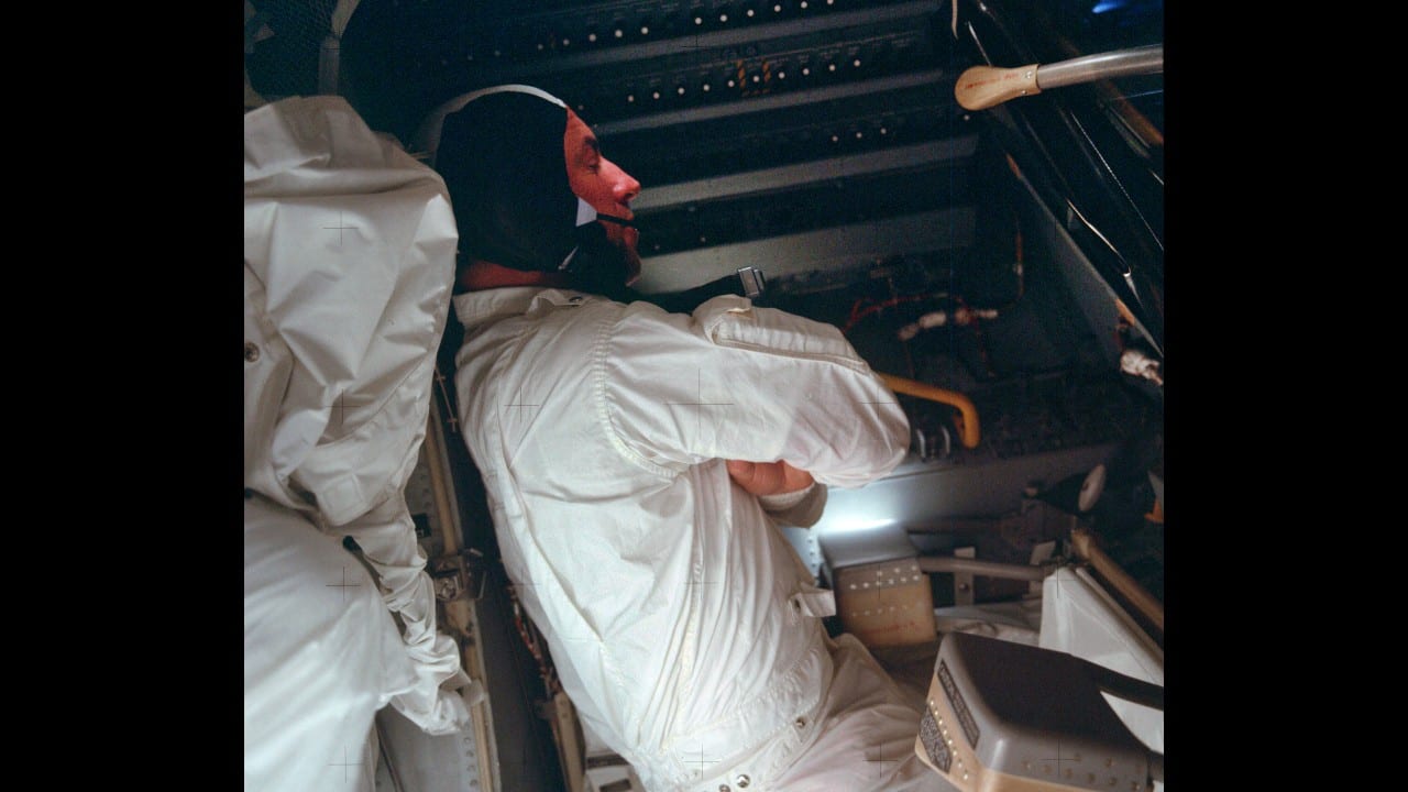This April 1970 photo made available by NASA shows astronaut Jim Lovell during the Apollo 13 mission. (NASA via AP)