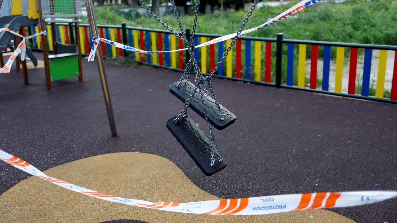 Empty playground, closed due to corona virus, forbidden to enter