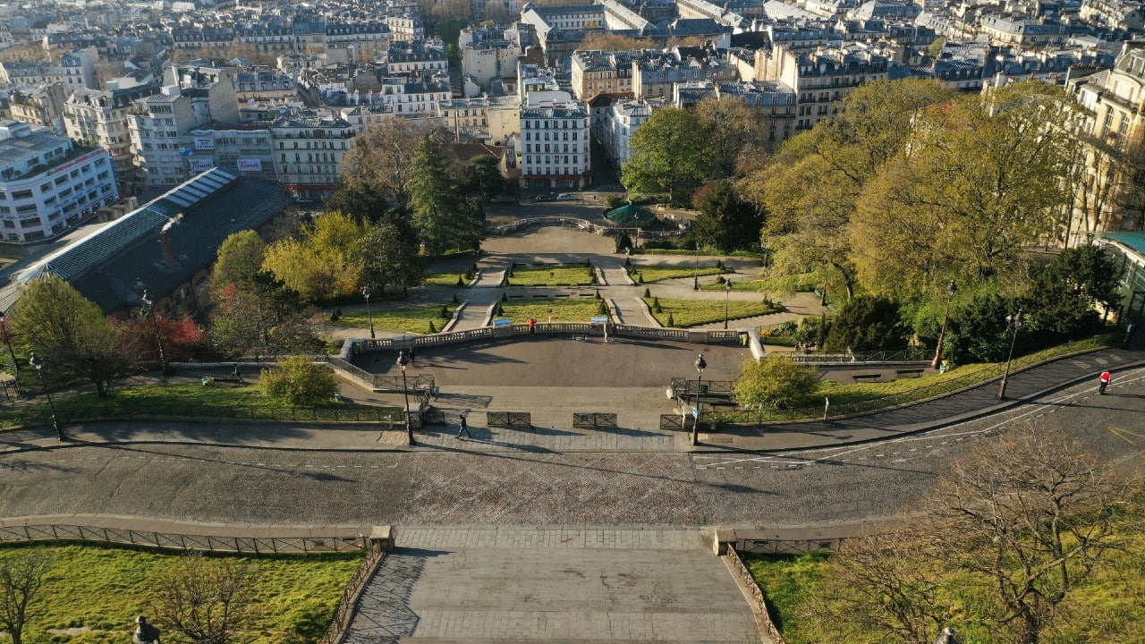 Almost deserted Butte Montmartre and the Sacre-Coeur Basilica can be seen in the aerial picture taken by drone during lockdown imposed in Paris, France. (Image: Reuters)