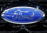 Ford posts lower profit, issues downbeat outlook; shares drop