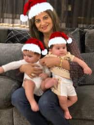 Mala with her grandchildren.