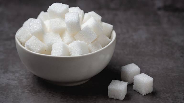 India extends curbs on sugar exports to calm domestic prices