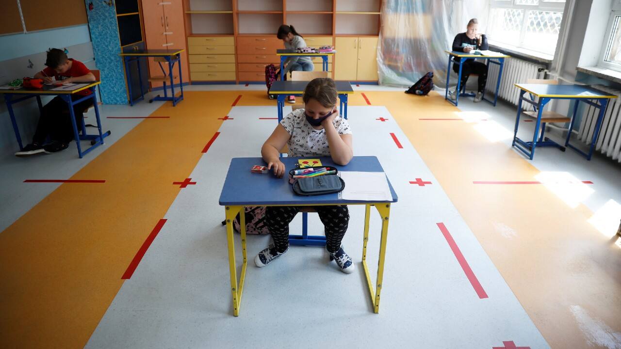 Children take part in a lesson after schools reopened for grades 1-3 amid the coronavirus lockdown in Warsaw, Poland, May 25, 2020. (Image: Reuters) Children take part in a lesson after schools reopened for grades 1-3 amid the coronavirus lockdown in Warsaw, Poland, May 25, 2020. (Image: Reuters)