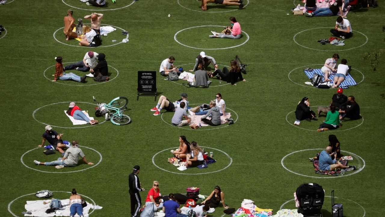 People in Domino Park are seen in circles painted as guidelines for social distancing in Brooklyn, New York City, U.S., May 24, 2020. (Image: Reuters) People in Domino Park are seen in circles painted as guidelines for social distancing in Brooklyn, New York City, U.S., May 24, 2020. (Image: Reuters)