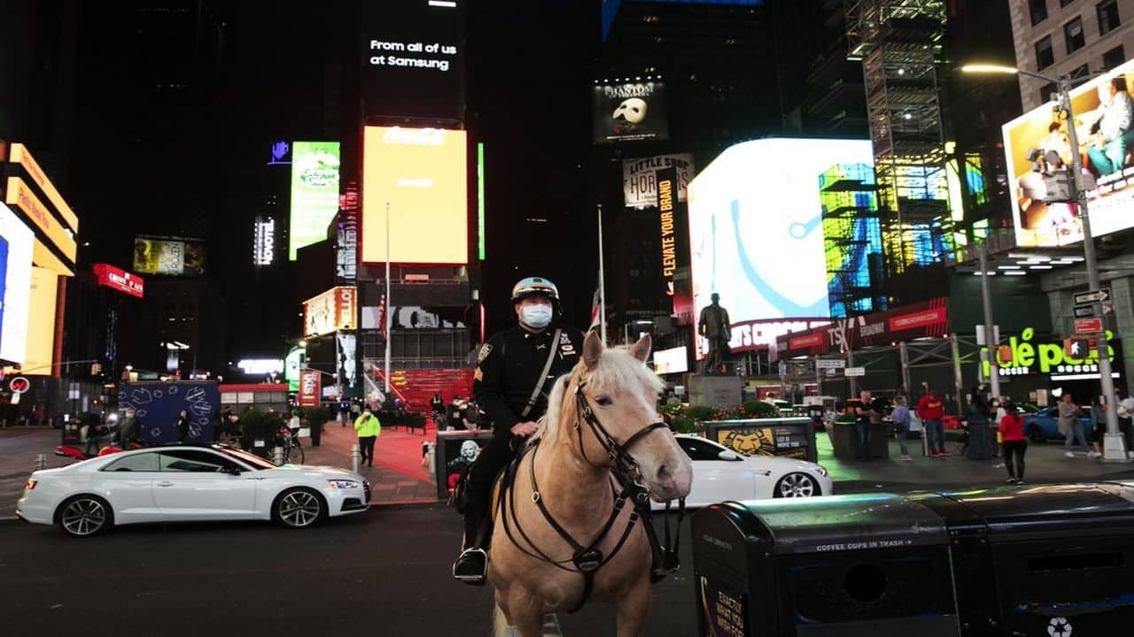 Police — some in cars, some on horseback — were mostly patient with the procession and only intervened if cars remained parked for too long. (AP)