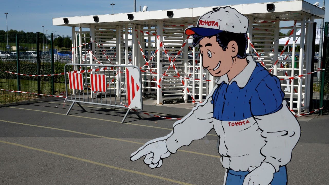 Social distancing signs are seen outside the Toyota Motor Manufacturing France plant in Onnaing, France, on May 7. (Image: Reuters) Social distancing signs are seen outside the Toyota Motor Manufacturing France plant in Onnaing, France, on May 7. (Image: Reuters)