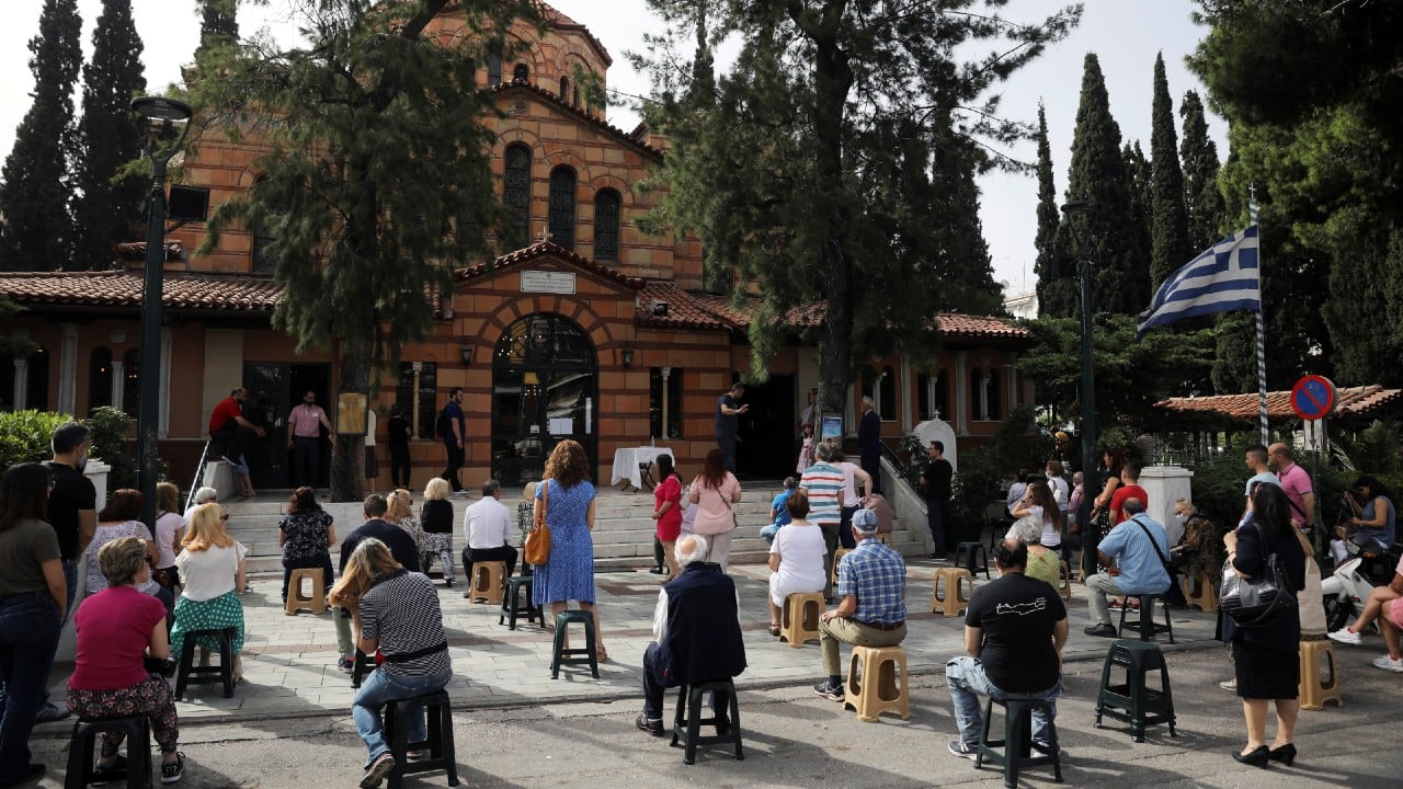 Orthodox faithful attend the first service open for believers following the easing of measures against the spread of COVID-19 in Athens. (Image: Reuters)