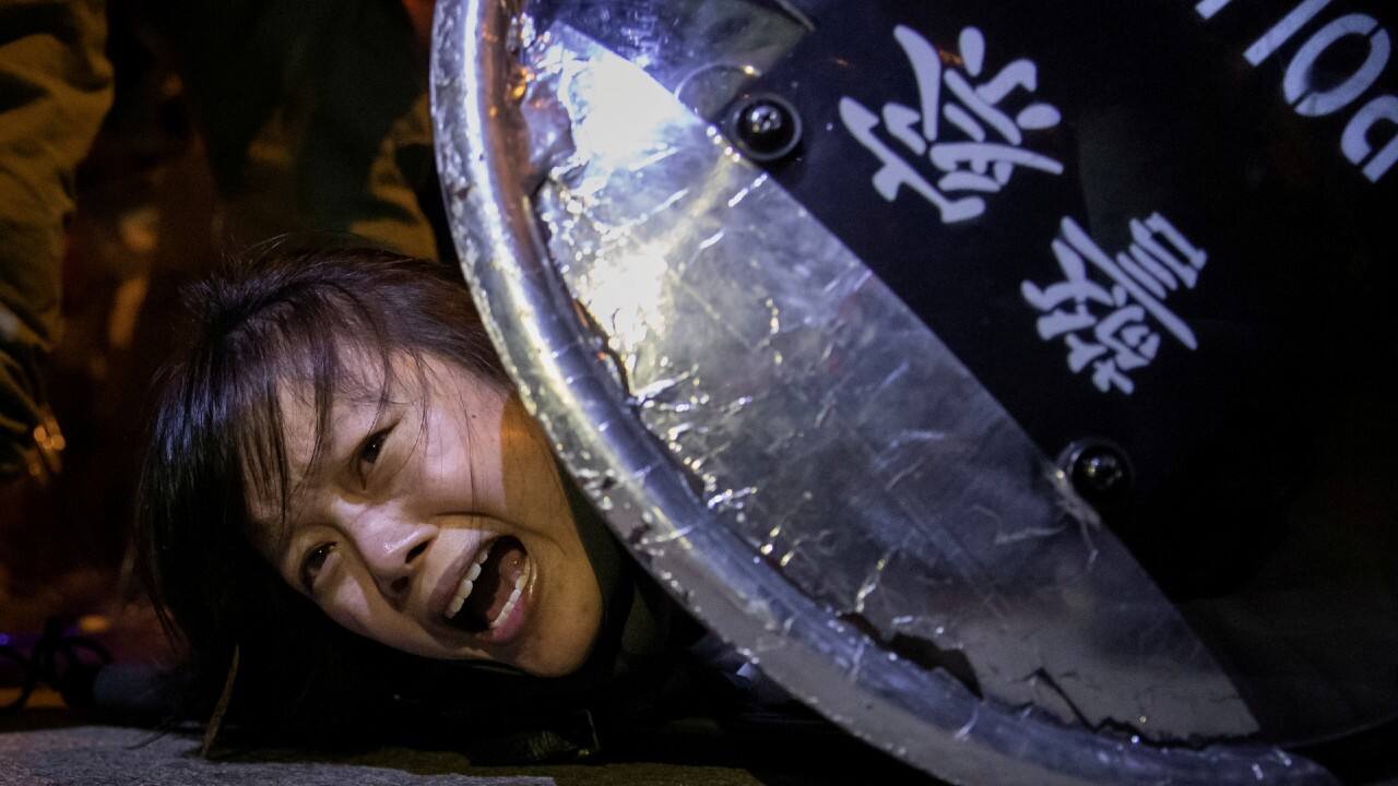 An anti-extradition bill protester is detained by riot police during skirmishes between the police and protesters outside Mong Kok police station, in Hong Kong, China September 2, 2019. (Image: Reuters /Tyrone Siu)