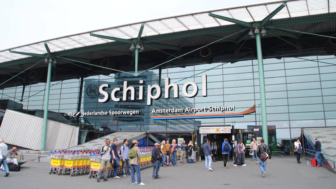 Europe airports cut flights amid holiday rush, staff shortage