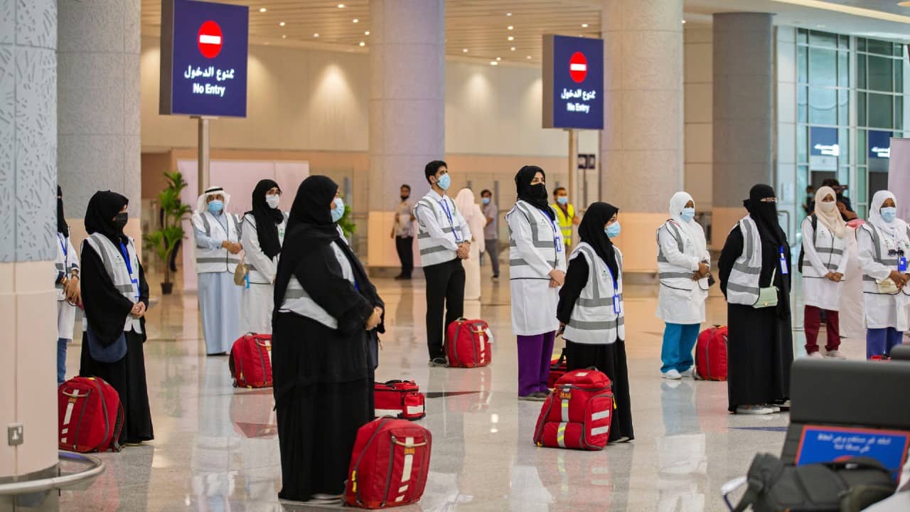 Muslim pilgrims have started arriving in Mecca. With only a few thousand residents of Saudi Arabia permitted to take part due to the rising concerns over the pandemic, Islamic pilgrimage has downsized this year. Pilgrims arrive to King Abdulaziz Airport for the Hajj pilgrimage to Mecca, in Jeddah, Saudi Arabia, July 25. (Saudi Ministry of Media via AP)