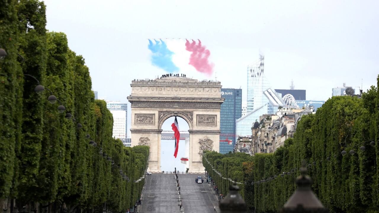 Alpha jets from the French Air Force Patrouille de France fly over the Arc de Triomphe during the Bastille Day celebrations in Paris. (Image: Reuters)