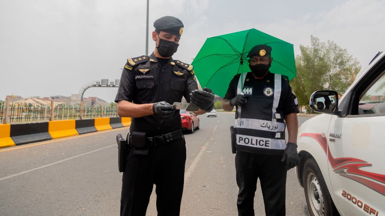 The hajj normally draws around 2.5 million people to worship in one of the world's largest gatherings of people from around the world. But this year, Saudi Arabia's Hajj Ministry has allowed a number of pilgrims between 1,000 and 10,000 who are already residing in the kingdom. Among them two-thirds of those pilgrims will be foreign residents in Saudi Arabia and one-third will be Saudi citizens. In this photo of July 26, Saudi security officers check the identification cards of people entering Mecca ahead of the annual hajj pilgrimage. (Saudi Ministry of Media)
