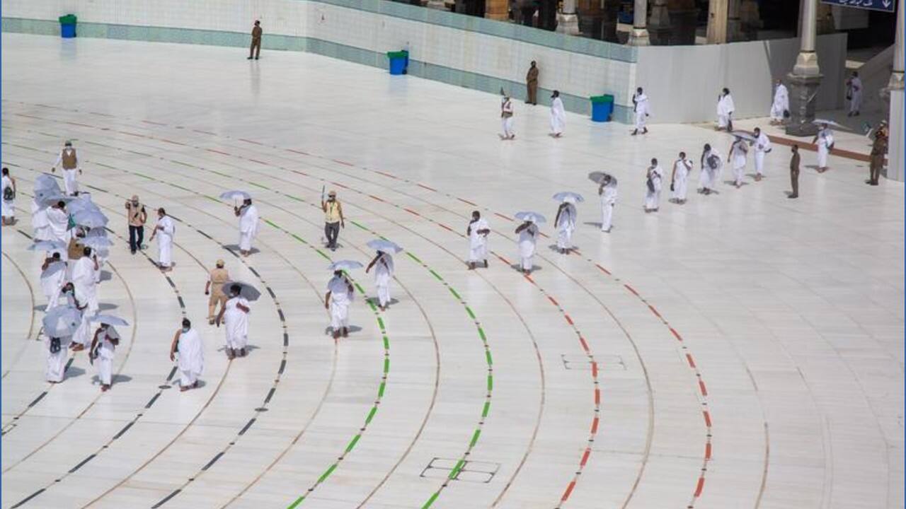 Muslim pilgrims maintain social distancing as they arrive to circle the Kaaba, July 29. (Image: Saudi Ministry of Media via REUTERS)