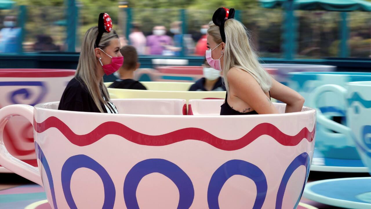 Visitors enjoy the Mad Hatters Tea cups at Disneyland Paris as the theme park reopens its doors to the public in Marne-la-Vallee, near Paris, France, July 15. (Image: Reuters)
