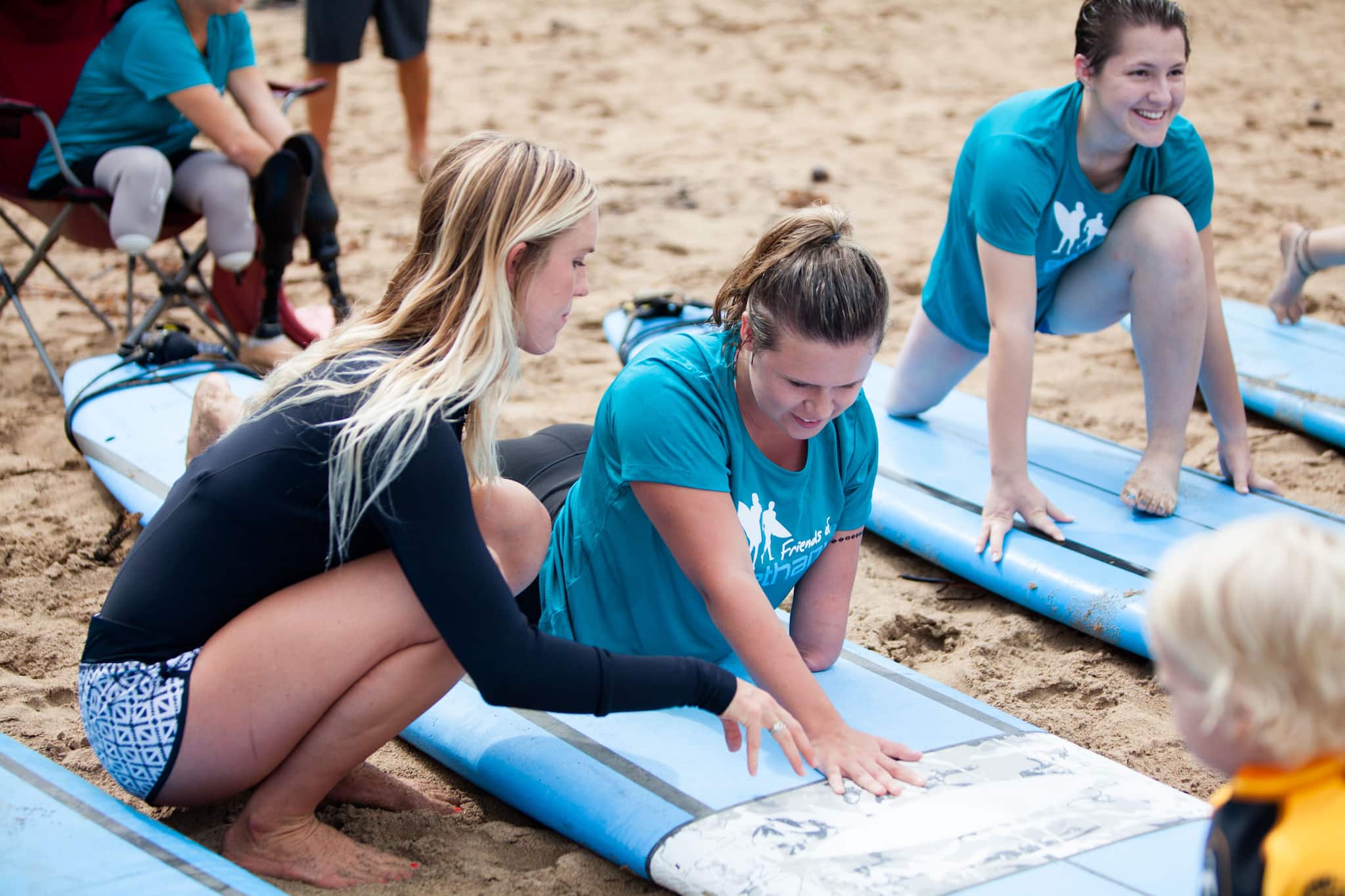 Bethany giving surfing lessons at her retreat.