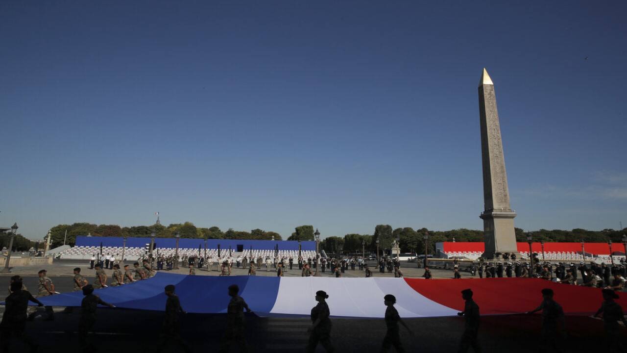France celebrates coronavirus heroes on redesigned Bastille Day