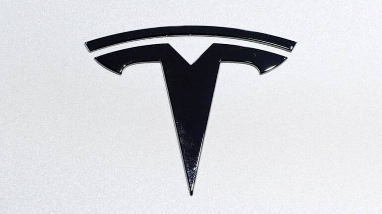 Elon Musk's red satin Tesla 'short shorts' sell out in minutes