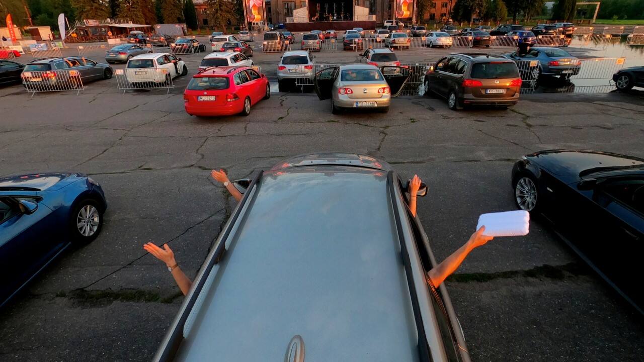 People sit in their cars as they enjoy a drive-in concert in Riga, Latvia June 11. (Image: Reuters)