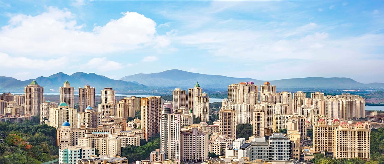 Investing in real estate back home – what’s in it for the non-resident Indian?