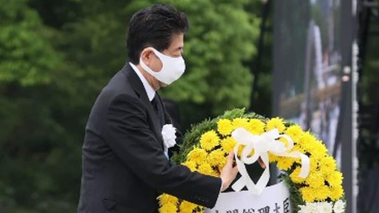 Japan's Prime Minister Shinzo Abe, who has been criticised by some for his attempts to revise a key pacifist clause of the country's constitution, pledged in his address to "do my best for the realisation of a world without nuclear weapons and peace for all time".