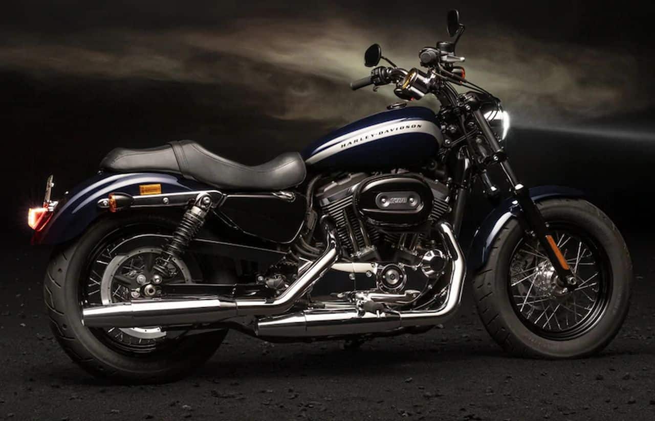 1200 Custom | Rs 10.89 lakh | The 1200 Custom gets the same 1,202cc engine producing 96 Nm and the same tyres. But there are obvious differences to the bike along with its riding position considering the pulled back handlebars and mid-mounted footpegs.
