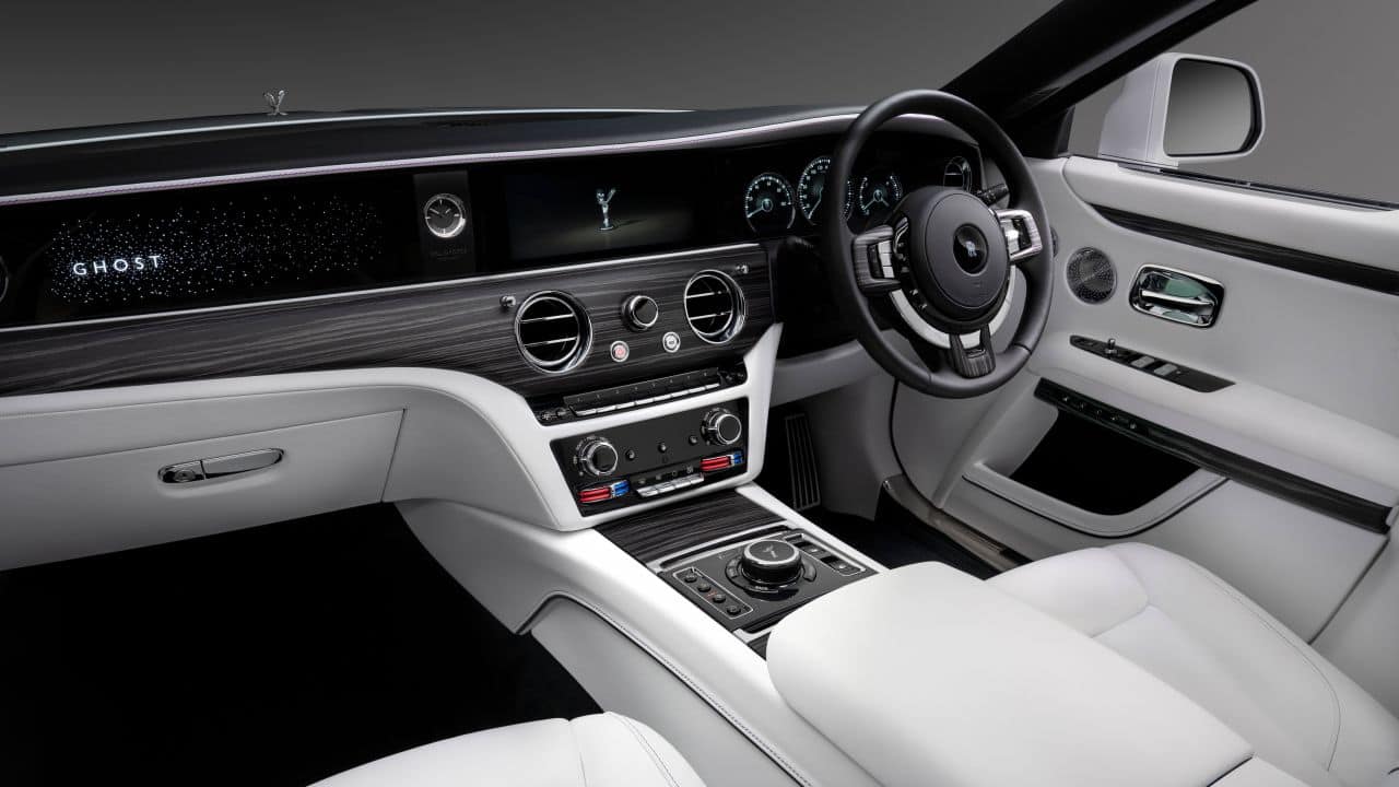 Getting to the interiors of the Ghost, there are changes but the familiarity of minimalism and high-end luxury will not be missed. ‘Stars’ have now been added to the dashboard extending what used to already be present in the headliner. There is now a touchscreen unit which is hidden away when the car is off, but everything else looks fashionable. (Image source: Rolls-Royce)