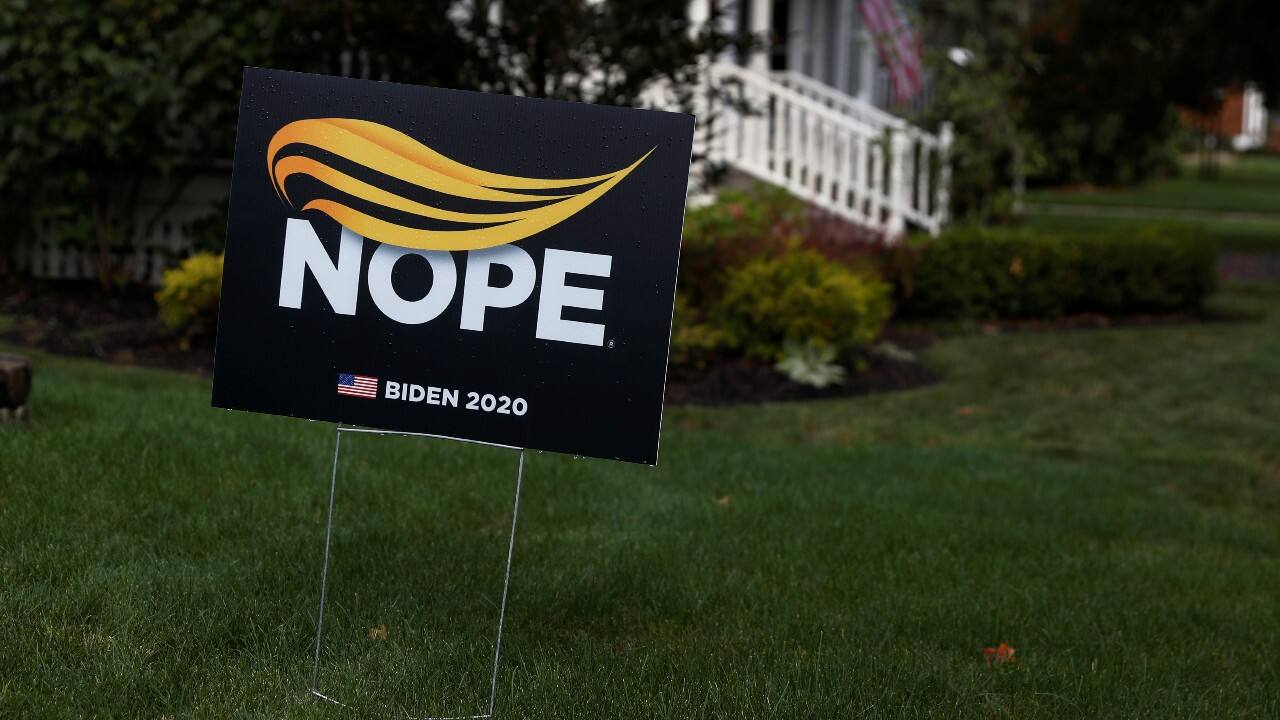 A sign supporting Democratic U.S. presidential candidate Joe Biden sits in the front yard of a home in Chagrin Falls, Ohio, U.S., September 29. (Image: Reuters)