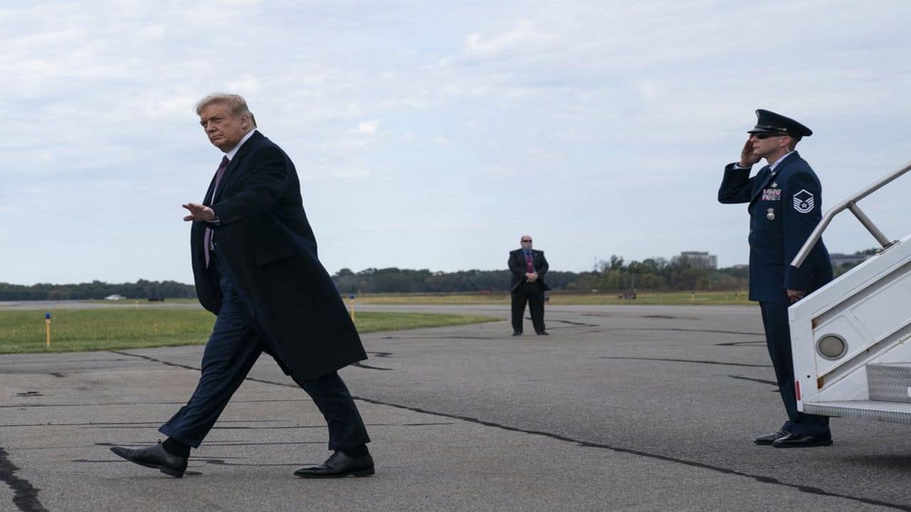 President Donald Trump arrives at Morristown Municipal Airport to attend a fundraiser at Trump National Golf Club in Bedminster, Thursday, October 1, 2020, in Morristown, N.J. (AP Photo)