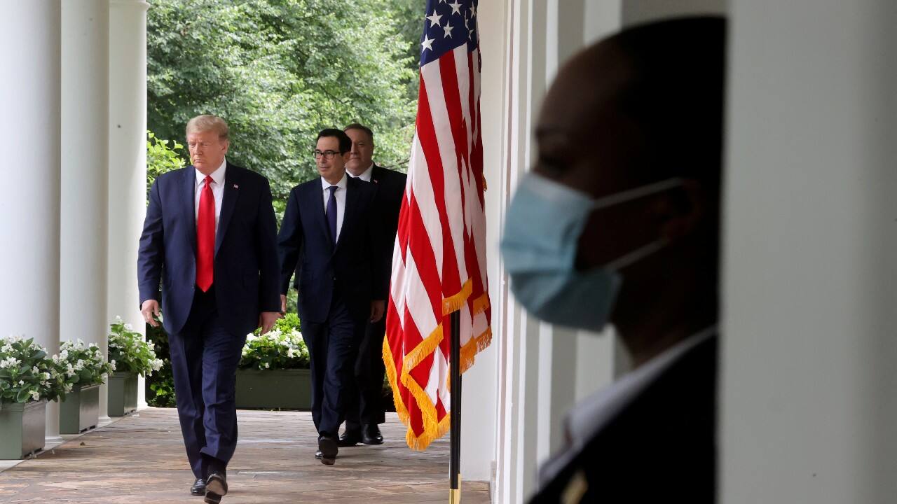 In May, the president refused to wear a protective mask in the West Wing of the White House, saying, “I felt no vulnerability whatsoever,” during a conversation with the reporters while his staff and the reporters present were seen donning a face cover. (Image: Reuters)