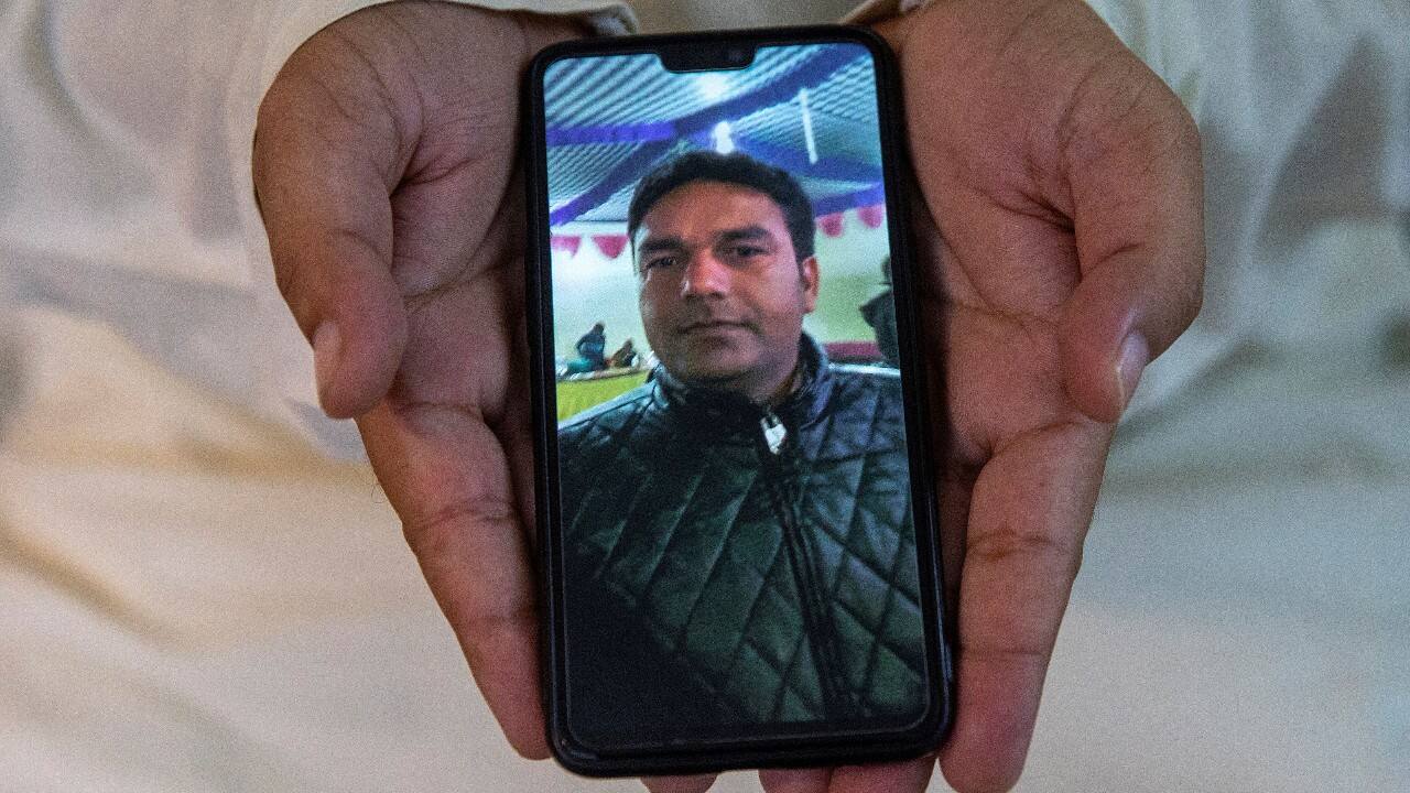 Asim Khan shows a picture on his phone of his brother-in-law Jamal Khan, 41, a farmer, who died due to the coronavirus, as he poses for a photograph, in New Delhi, India, September 24. According to Asim, Jamal developed a fever in August and local doctors failed to realise he was COVID-positive. It was only when he was transferred to Delhi, ten days after he first became ill, that he was diagnosed. By then, his lungs were badly damaged, and he died soon after, according to his brother, Asim. "My brother-in-law was a farmer. He never got sick and was healthy," said Asim. "If he would have been diagnosed on time in his own native place, he would have surely survived." (Image: Reuters) Asim Khan shows a picture on his phone of his brother-in-law Jamal Khan, 41, a farmer, who died due to the coronavirus, as he poses for a photograph, in New Delhi, India, September 24. According to Asim, Jamal developed a fever in August and local doctors failed to realise he was COVID-positive. It was only when he was transferred to Delhi, ten days after he first became ill, that he was diagnosed. By then, his lungs were badly damaged, and he died soon after, according to his brother, Asim. "My brother-in-law was a farmer. He never got sick and was healthy," said Asim. "If he would have been diagnosed on time in his own native place, he would have surely survived." (Image: Reuters)