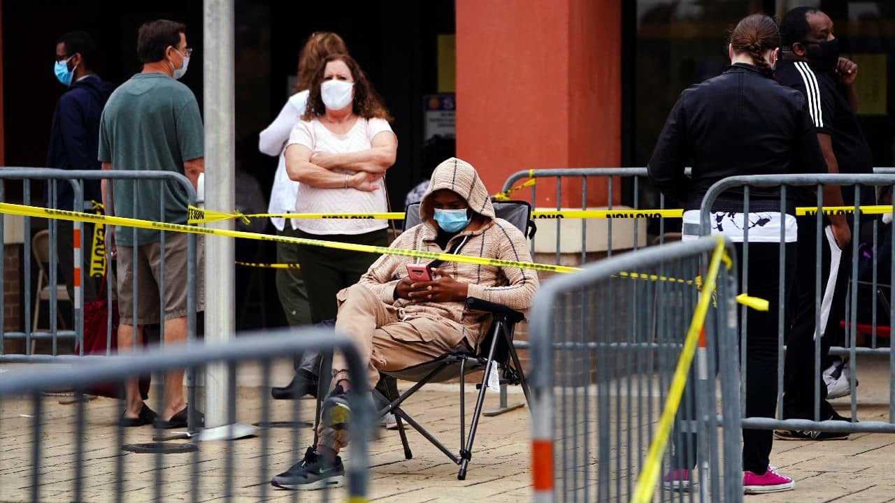Voters line up to cast their election ballot at a Cobb County polling station in Marietta, Georgia on October 13. (Image: Reuters)