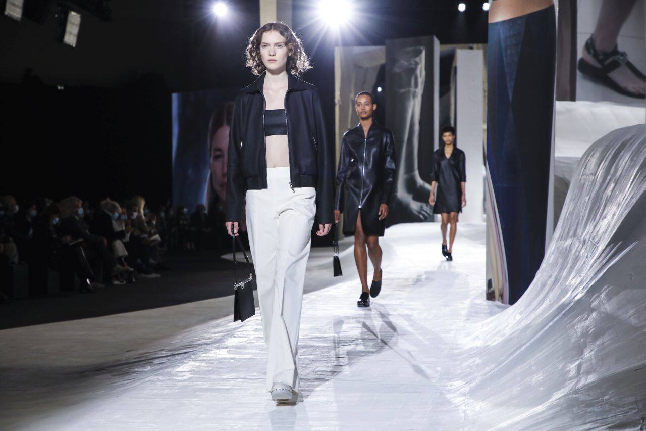 Westwood modeled again in a rather wacky but regal-looking thick trapeze-shaped gown in pale yellow. It looked as if the wardrobes of Marie Antoinette and the late Queen Mother of Britain had cross-pollinated. (Source: AP News)