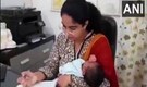 IAS officer returns to work two weeks after giving birth, carries baby to office