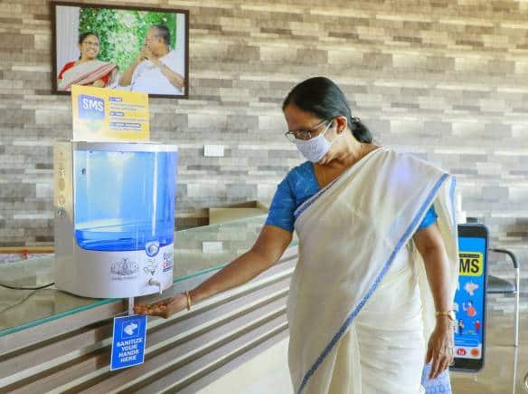 KK Shailaja launching automatic sanitizer machine in 2nd phase of break the chain campaign