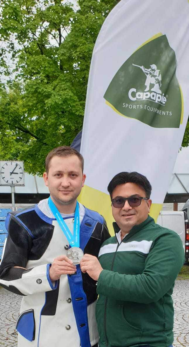 Entrepreneur Nilesh Rane, right, with Olympic shooter Peter Gorsa