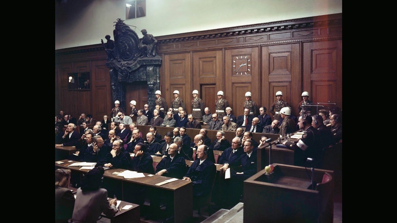 Seventy-five years ago, the dock of Courtroom 600 of the Nuremberg Palace of Justice was packed with some of the most nefarious figures of the 20th Century: Hermann Goering, Rudolf Hess, Joachim von Ribbentrop and 18 other high-ranking Nazis. They weren’t yet known as war criminals - it was a charge that didn’t exist until the Nuremberg trials that began on November 20, 1945, in what is now seen as the birthplace of a new era of international law. The proceedings broke new ground in holding government leaders individually responsible for their aggression and slaughter of millions of innocents. Its legacy lives on in the International Criminal Court of today. The city of Nuremberg marked the anniversary in Courtroom 600 with a ceremony on November 20. Let’s take a look at the collection of pictures of the trials. From the archive. (Image: AP) Seventy-five years ago, the dock of Courtroom 600 of the Nuremberg Palace of Justice was packed with some of the most nefarious figures of the 20th Century: Hermann Goering, Rudolf Hess, Joachim von Ribbentrop and 18 other high-ranking Nazis. They weren’t yet known as war criminals - it was a charge that didn’t exist until the Nuremberg trials that began on November 20, 1945, in what is now seen as the birthplace of a new era of international law. The proceedings broke new ground in holding government leaders individually responsible for their aggression and slaughter of millions of innocents. Its legacy lives on in the International Criminal Court of today. The city of Nuremberg marked the anniversary in Courtroom 600 with a ceremony on November 20. Let’s take a look at the collection of pictures of the trials. From the archive. (Image: AP)