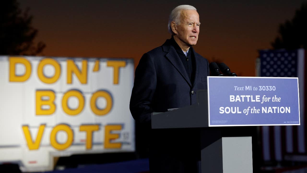 Democratic U.S. presidential nominee and former Vice President Joe Biden speaks at a campaign drive-in, mobilization event in Detroit, Michigan, U.S., October 31. (Image: Reuters)