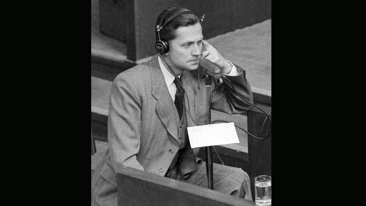 Former German Nazi SS-Brigadefuehrer and former head of foreign intelligence Walter Schellenberg is seen in the witness box on January 4, 1946 in Nuremberg, Germany during the war crime trials whilst giving evidence. (Image: AP) Former German Nazi SS-Brigadefuehrer and former head of foreign intelligence Walter Schellenberg is seen in the witness box on January 4, 1946 in Nuremberg, Germany during the war crime trials whilst giving evidence. (Image: AP)